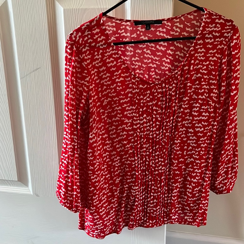 Red 3/4 rayon blouse with front panel details.